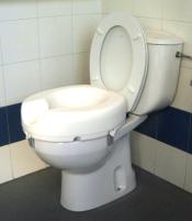 asiento elevador para un inodoro colocado